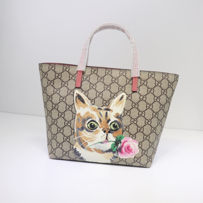 G*u*i shopping bags